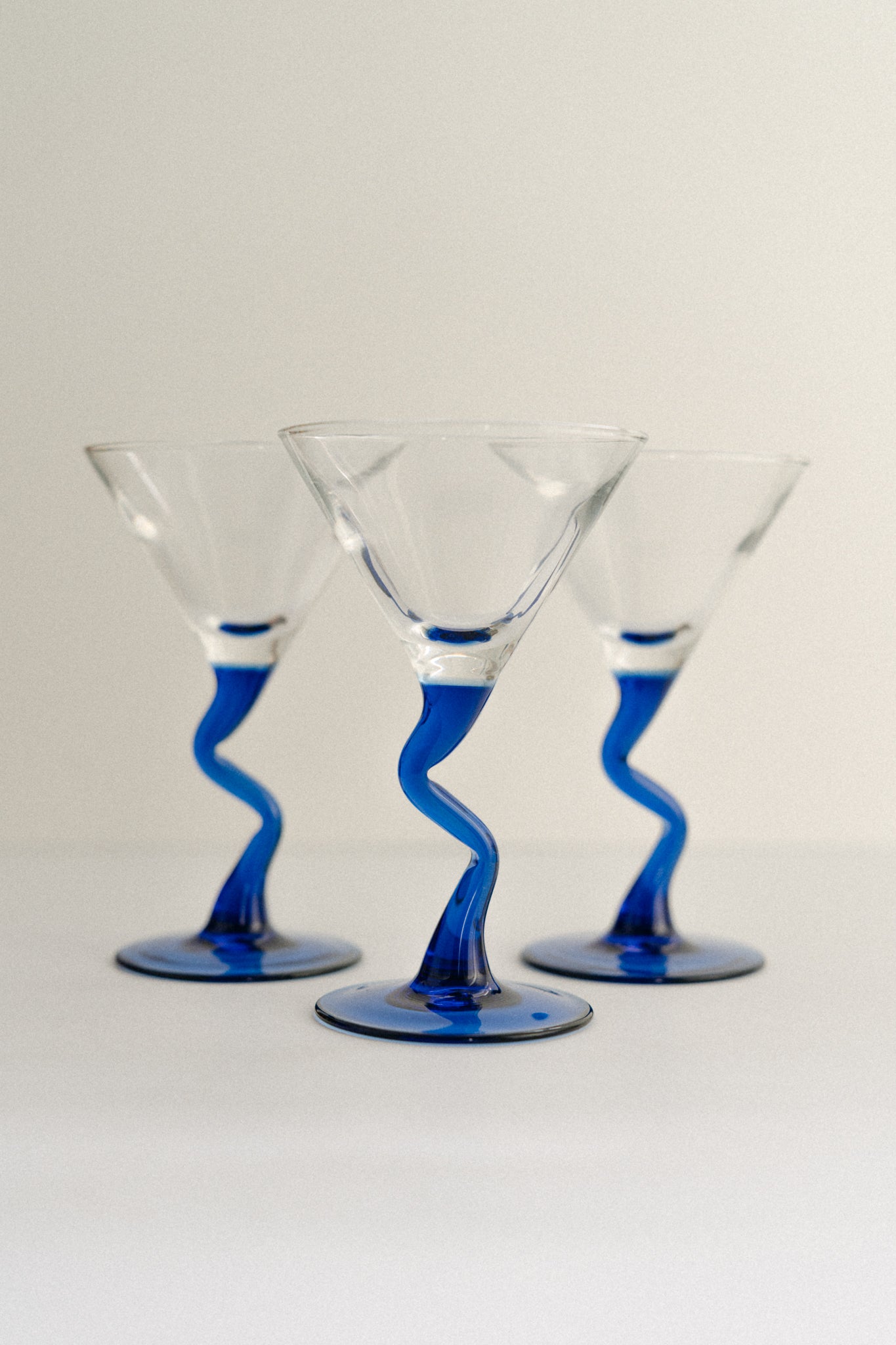 Martini Glasses with Cobalt Blue Wave Stems (Set of 4) - Four Sets Available
