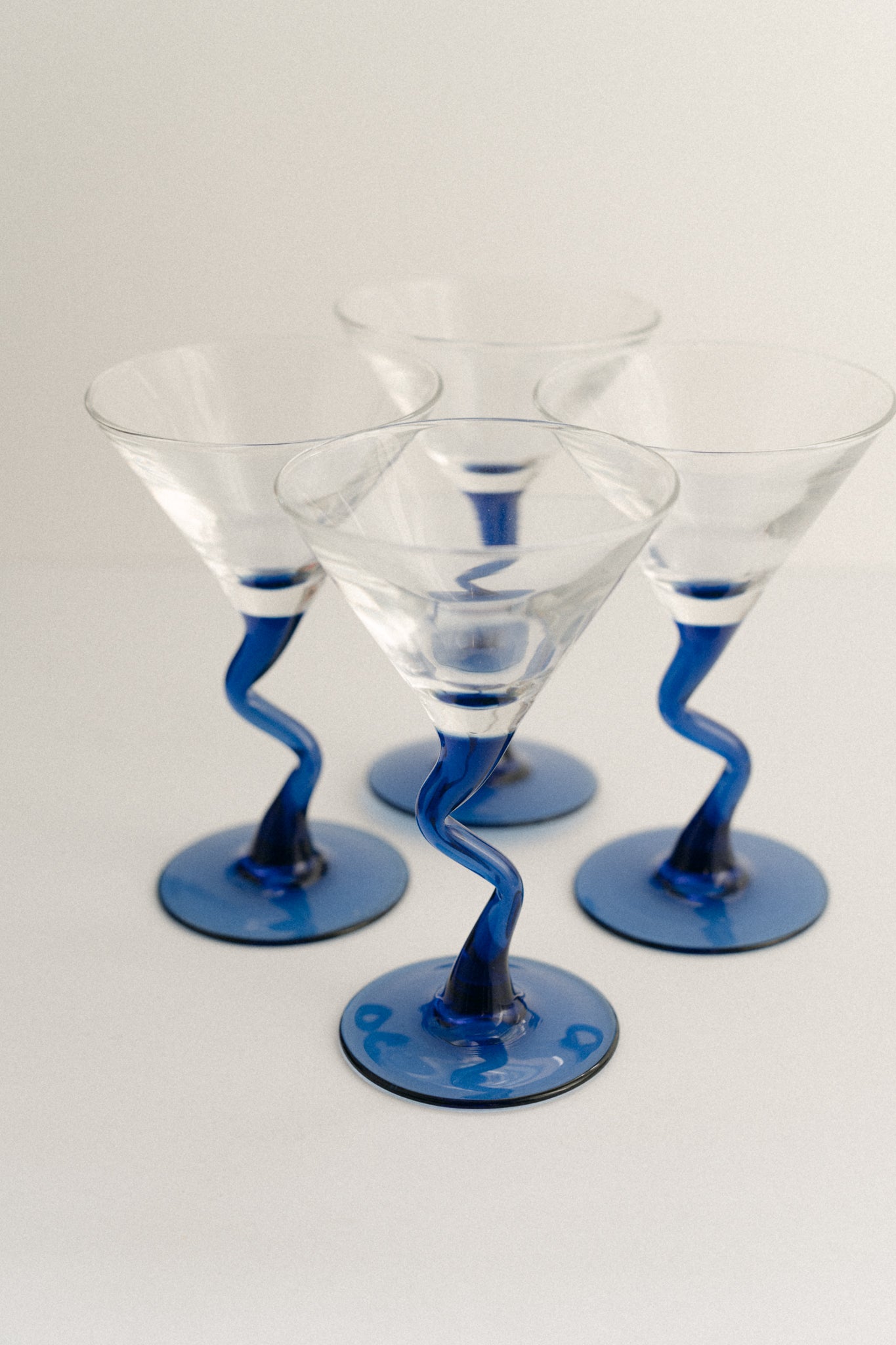 Martini Glasses with Cobalt Blue Wave Stems (Set of 4) - Four Sets Available